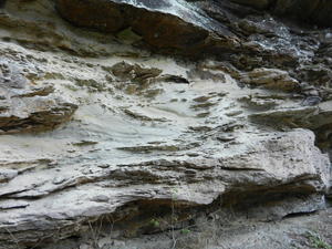 Layers of sandstone and minerals.