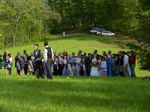 Photograph session. (The guests, bridesmaids and the bride all had to hike up that hill to get to the wedding!)