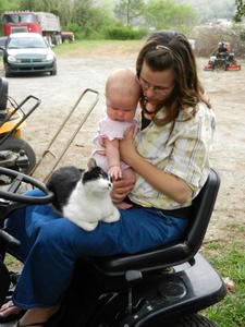 Miranda is learning how to pet the cat.