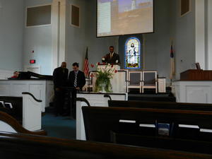 We spent a weekend in Nashville as speakers for another Evangelism Summit. Here someone is leading song service, while David Hartman and Olin McGraw get the computer set up for Church.