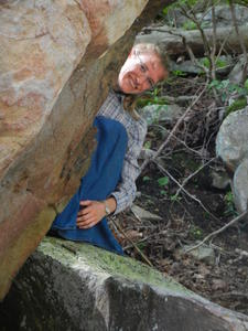 Kristina enjoyed the shady view under a large overhanging rock. 