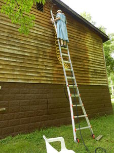 The worst side was the right side of the house. It's not real fun to be 15 feet in the air, trying to paint as far as your arms can reach!