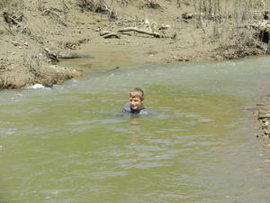 Daniel stopping to cool off in the shallow water.