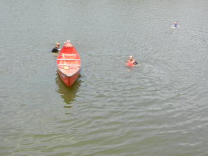 We found a nice beach, unloaded the canoes, and jumped in! The water was like bathwater--unbelievably warm!