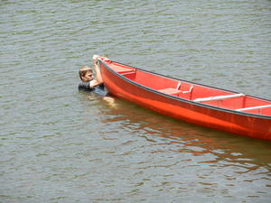 Daniel doing what he loves best--playing with the canoe.