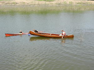 Dad paddling out to the rescue.