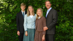 Daniel and Kristina (before haircuts) with Kristina's parents.