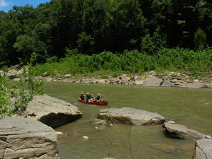 Daniel, Dad, and Tonya headed up river for some adventure.