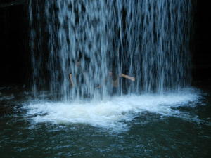 Danielle and Raven cooling off under the falls.
