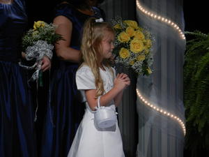 Flower girl during the prayer