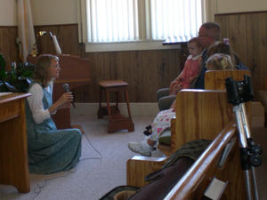 Kristina telling the children's story at church.