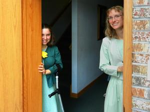 Kim and Kristina peeking out the door.