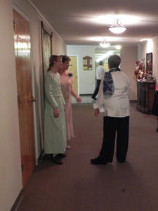 Meanwhile, Kristina was busy in the Bride's room, running errands, guarding the door, and helping with last-minute preparations.