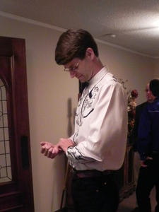 Checking his pulse....