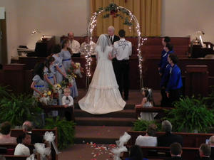 The wedding was beautiful, but the church was packed! Both Kristina and Daniel stood for the entire service!