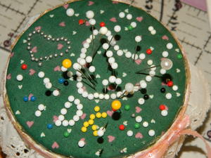 while Daniel decorates her pin cushion :)