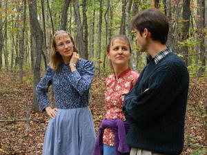 Taking a walk together out in the woods.
