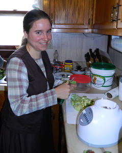 Kimberly helping to make the salad for Sabbath dinner.