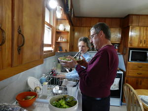 Thanksgiving day, we went to Daniel's parents' house. Timothy and Andrew had come down the night before, and Kimberly came up just before we left, so we had a fun group! Here Dad is making his famous salad. :)