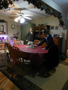 Kristina and Kimberly worked to take down the Thanksgiving decorations and put up the Christmas decorations while Daniel set up the tree in the living room.