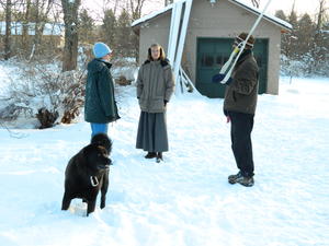 Kristina, Mom, and Uncle John playing with the swing.