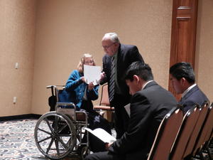 Kristina getting pianist instructions from the afternoon speaker.