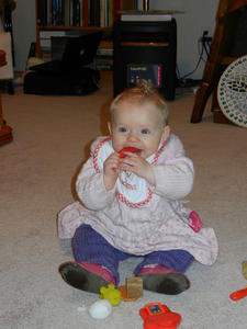Rosetta enjoying her toys. Kristina enjoyed babysitting all three kids.