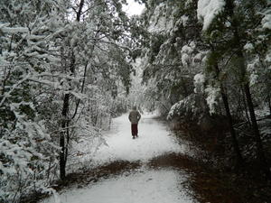 Kristina walking down the trail.