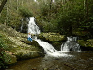 Kristina climbing up the falls.