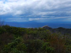 Un oh... look out in the distance! There's a rainstorm headed straight for us, and we have over 3.5 miles to hike back to our car! We headed back down the mountain at top speed!