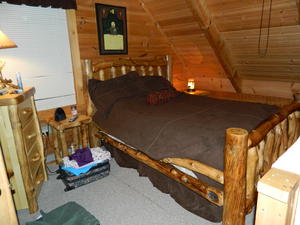 Our cute little bedroom in the loft upstairs.