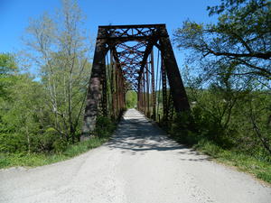 An old railroad tressel converted into a road bridge. It was quite a shock to run into the first time--seemed almost too narrow to cross!