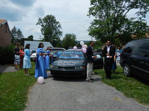 Daniel and Ernie were in charge of the car, so they rounded up some helpers to join them.