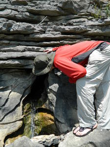 Erick and Daniel climbed up the bank to check out an invisible waterfall.