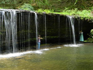 Siobhan and Kristina getting a neat picture under the Falls.