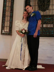 The happy couple taking a quick picture  just before the wedding service began.