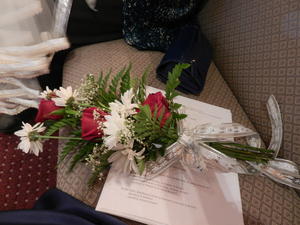 A Bridesmaid bouquet and a wedding bulletin.