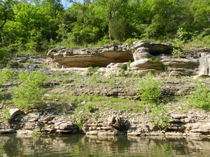 Looking back at our picnic ledge as we paddled away.