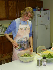 Kristina getting the food ready for the oven.