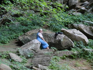 Donna watching from the top of the stairs.