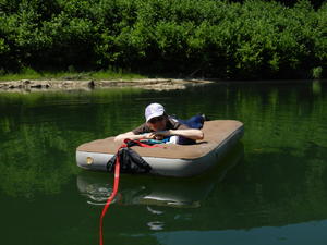 Kristina enjoyed floating on an old leaky air mattress...