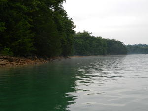 It finally calmed down about halfway there, and the evening mist started to rise from the lake.