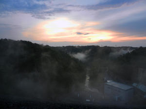 We made it back to our car, with only one inch of water that leaked in. PTL! This was our parting shot at the Laurel Lake Dam. You can see the sun setting and the mist rising from the base of the dam.
