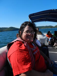 Susan with Kristina on the pontoon boat.