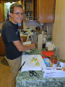 Levi helping Daniel in the Kitchen.