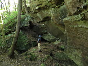 Rock wall with Levi next to it for perspective.