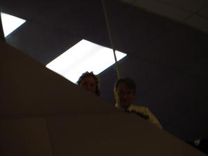 We attended our friend Serena's wedding. Here you can see the bride and her Dad peaking over the balcony watching the preliminaries. 