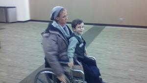 Kristina gave our little friend his first ride in a wheelchair!