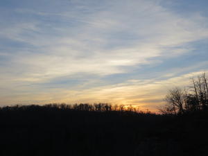 The sun was just sinking behind the ridge