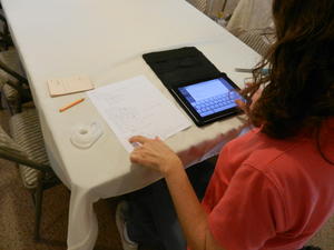 Denise helping Kristina. 